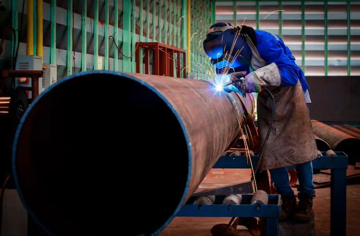 Steel structural framework at an active industrial construction site